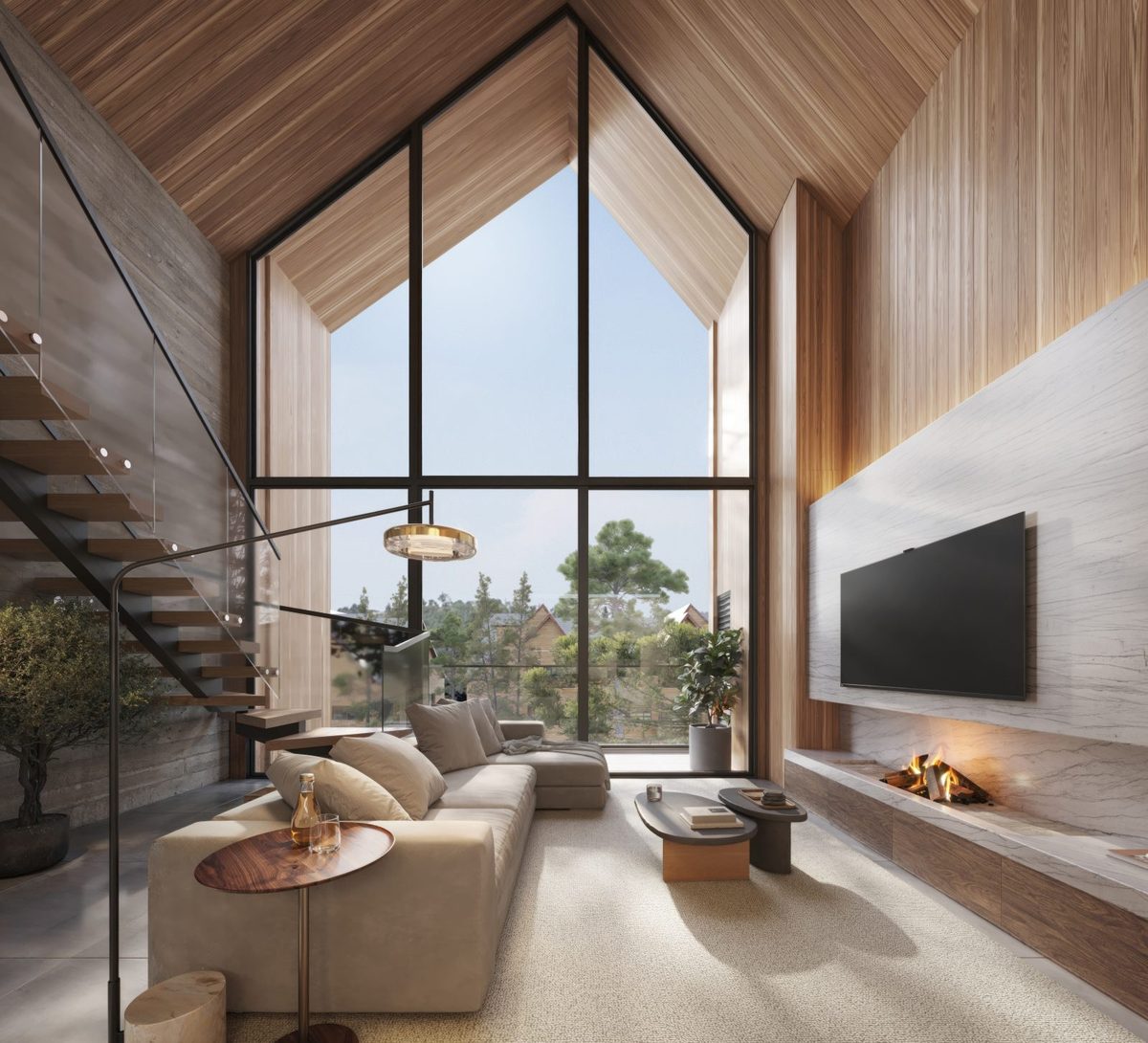 Living com pé-direito duplo, lareira e vista para a mata